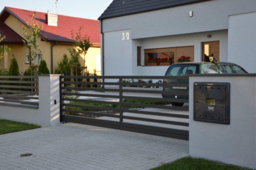 Wykonujemy i montujemy furtki oraz bramy stalowe, ocynkowane i malowane proszkowo. Nowoczesne i tradycyjne, bramy przesuwne i skrzydłowe - KIM Ogrodzenia Budzyń