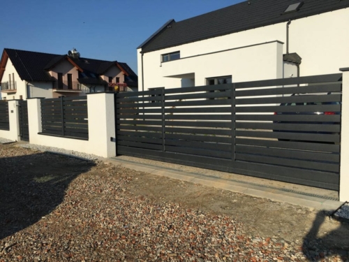 Wykonujemy i montujemy furtki oraz bramy stalowe, ocynkowane i malowane proszkowo. Nowoczesne i tradycyjne, bramy przesuwne i skrzydłowe - KIM Ogrodzenia Budzyń